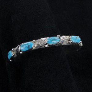 Small Silver Cuff with Five Turquoise Stones and Silver Leaf Decoration
