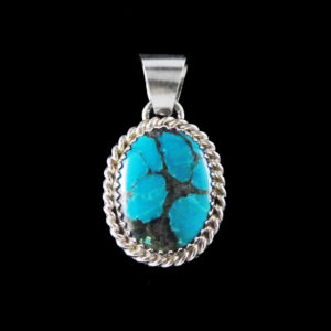 Small Turquoise Oval w Roped Silver