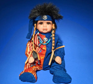 Pouty Navajo Doll in blue jumper
