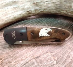 Eagle Head Inlaid Browning knife-background
