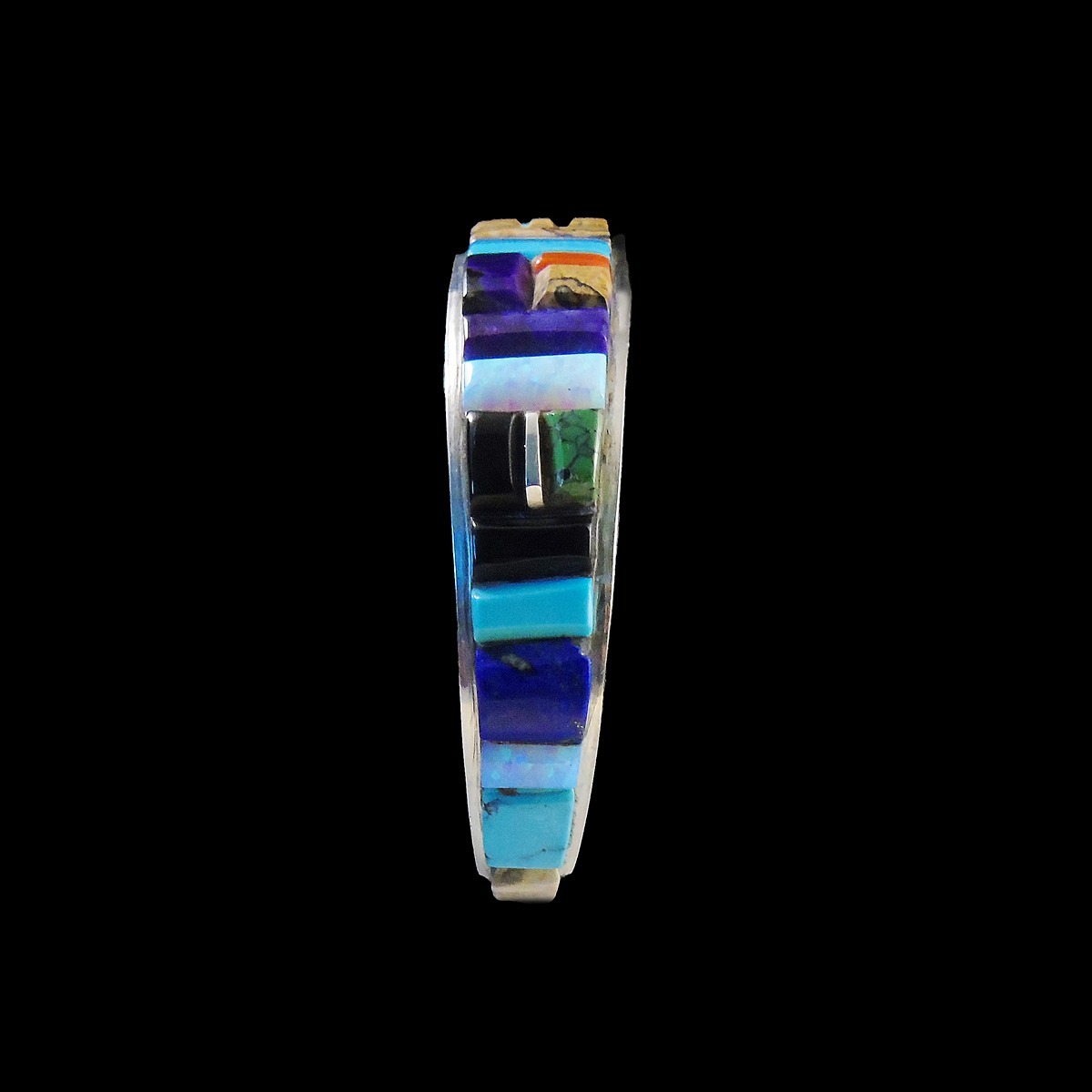 Handmade Navajo sterling silver cuff with cobblestone inlay featuring lapis, onyx, jasper, turquoise, opal, and spiny oyster. Authentic Southwest jewelry.