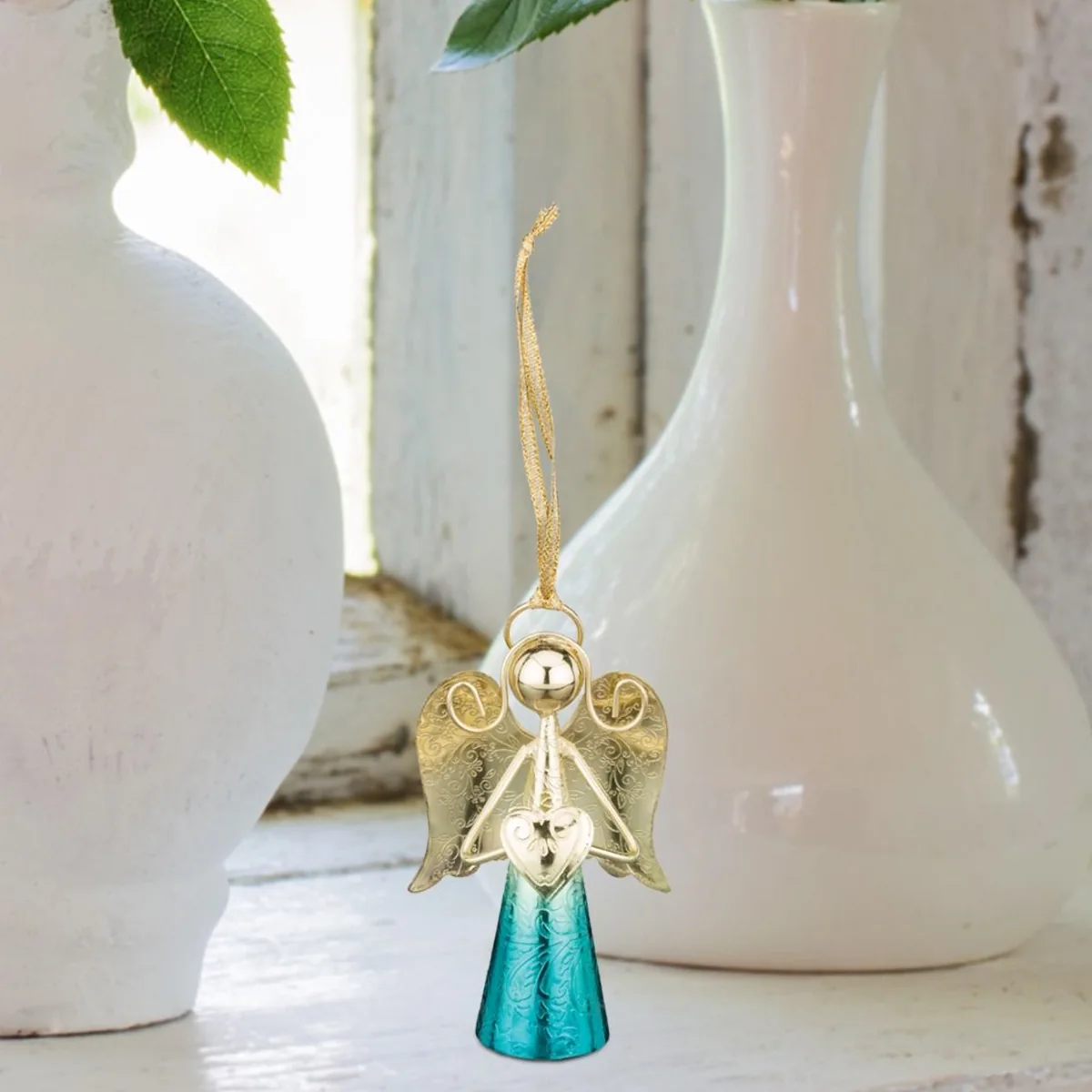 Regal Sedona 4 inch Blue Gold Stainless Steel Angel Bell Decor with metallic blue skirt, gold wings, and internal bell chime.